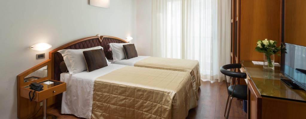 Quality Room for your 4 star Italian stay Hotel Continental Rimini